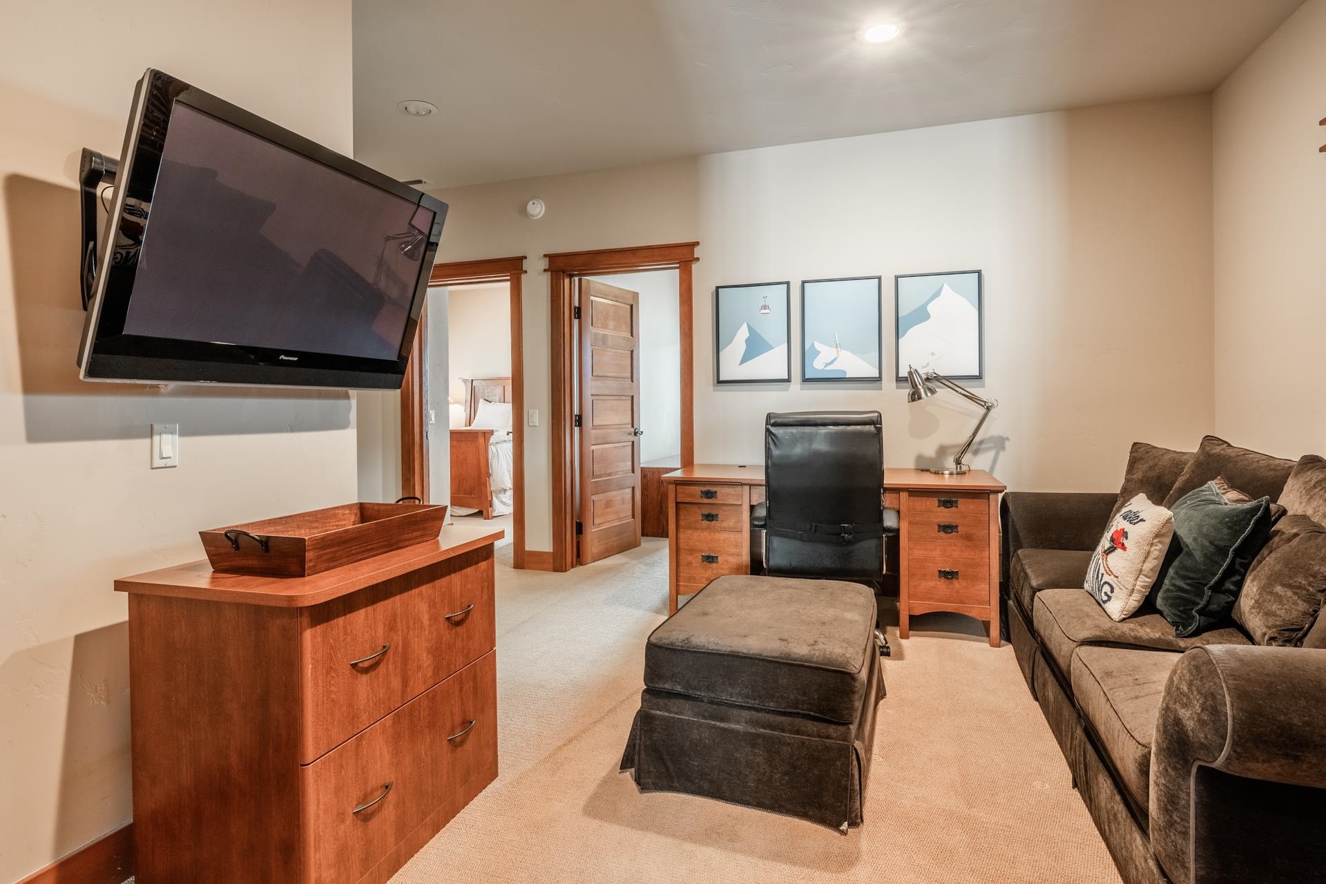 125 Davison Road, Unit 2 Mammoth Lakes, CA 93546 - Photo 34 of 50 a living room with furniture and a flat screen tv