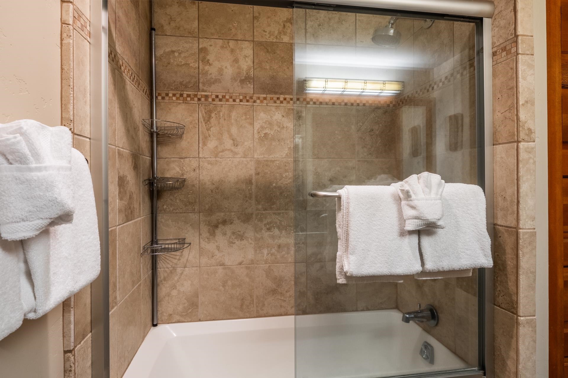 125 Davison Road, Unit 2 Mammoth Lakes, CA 93546 - Photo 40 of 50 a bathroom with a bathtub and shower