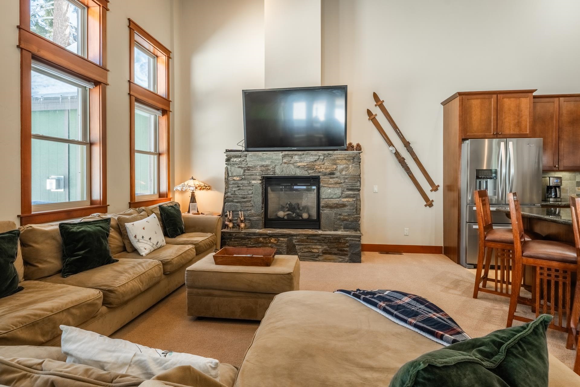 125 Davison Road, Unit 2 Mammoth Lakes, CA 93546 - Photo 4 of 50 a living room with furniture and a fireplace