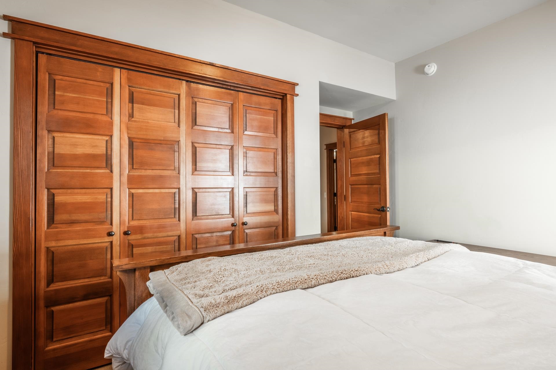 125 Davison Road, Unit 2 Mammoth Lakes, CA 93546 - Photo 43 of 50 a bedroom with a bed and a large window