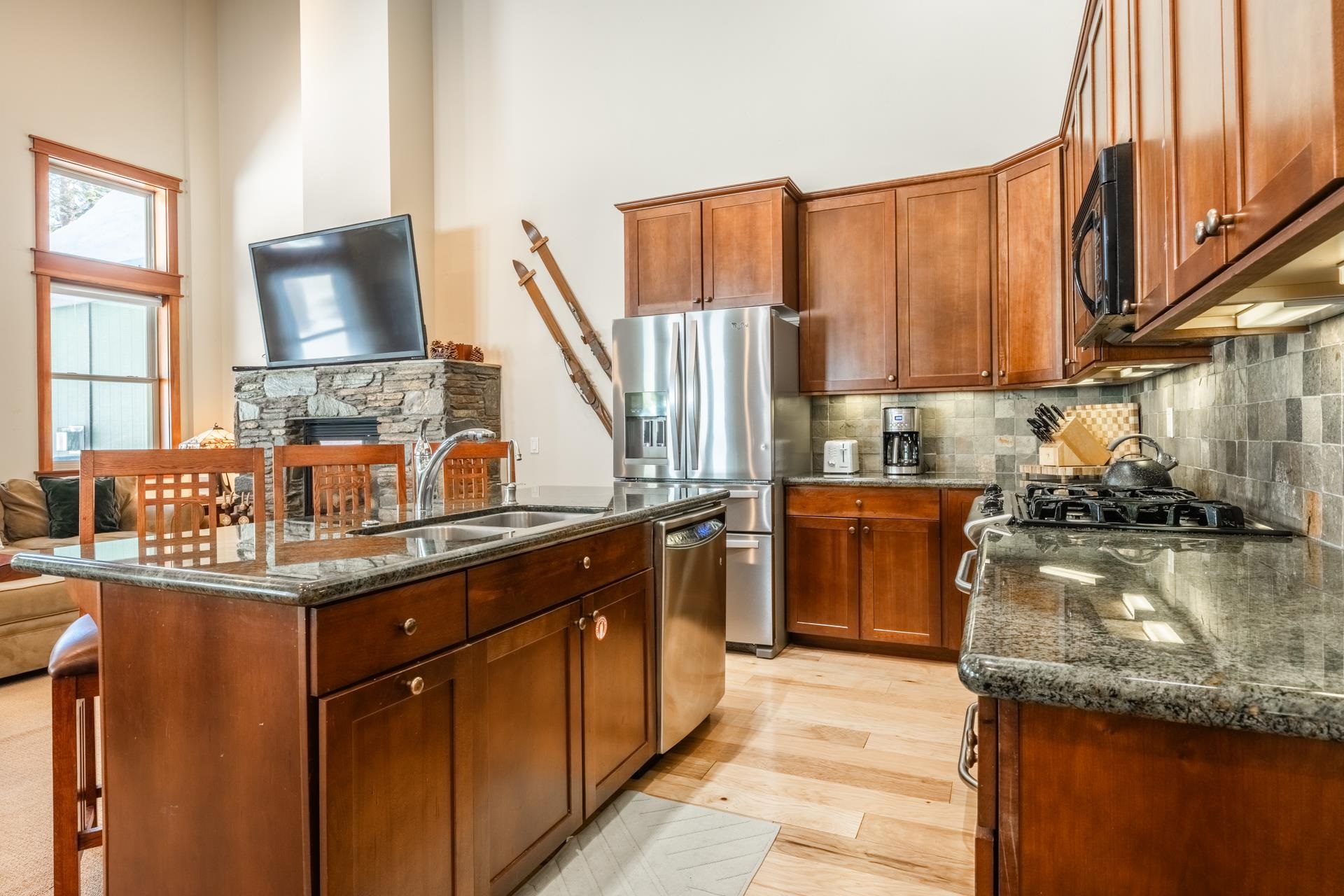 125 Davison Road, Unit 2 Mammoth Lakes, CA 93546 - Photo 10 of 50 a kitchen with a sink stove and cabinets