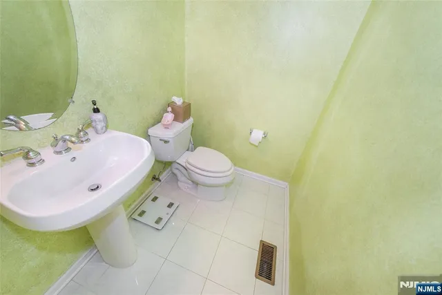 a view of a balcony with two chairs