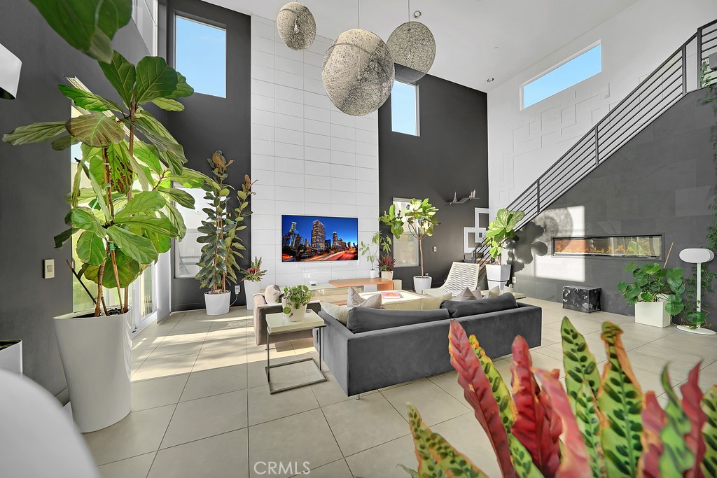 a living room with patio furniture