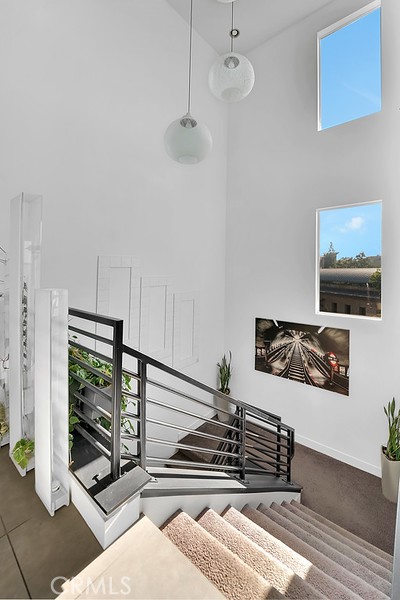 39 Gramercy Irvine, CA 92612 - Photo 21 of 48 a view of a livingroom with furniture and floor to ceiling window