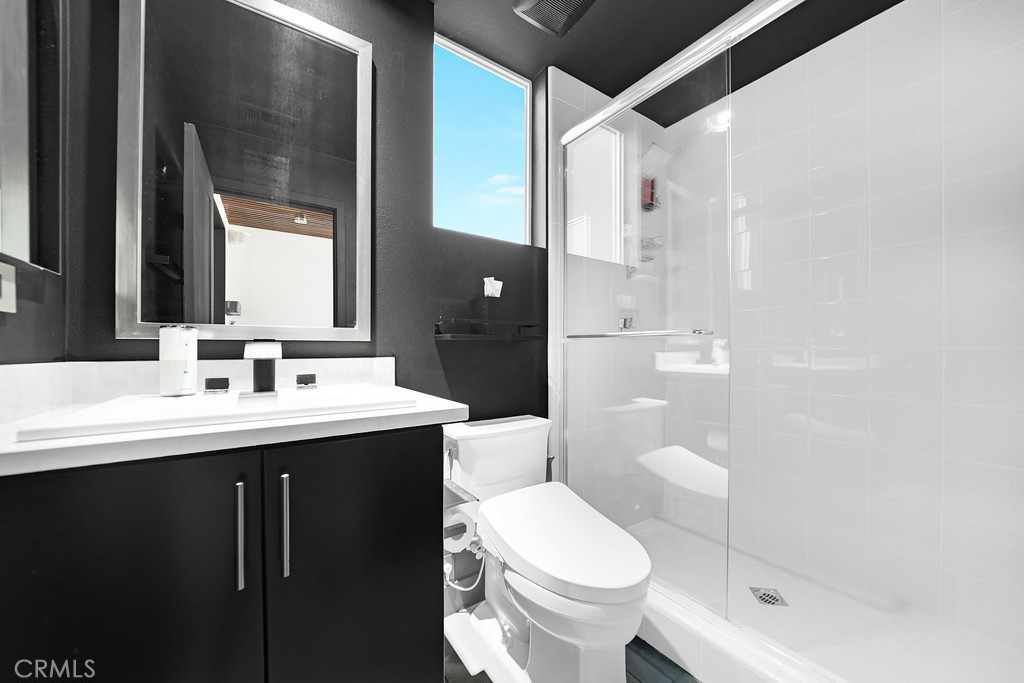 39 Gramercy Irvine, CA 92612 - Photo 27 of 48 a bathroom with a sink toilet and shower