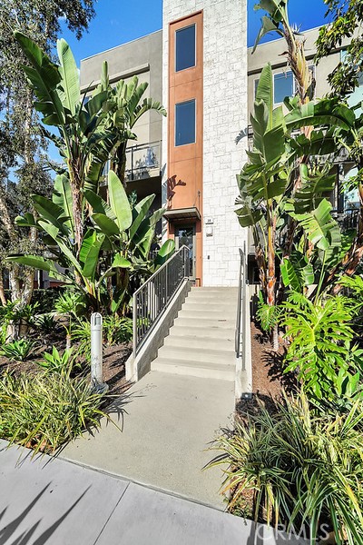 39 Gramercy Irvine, CA 92612 - Photo 28 of 48 a house with potted plant in front of it