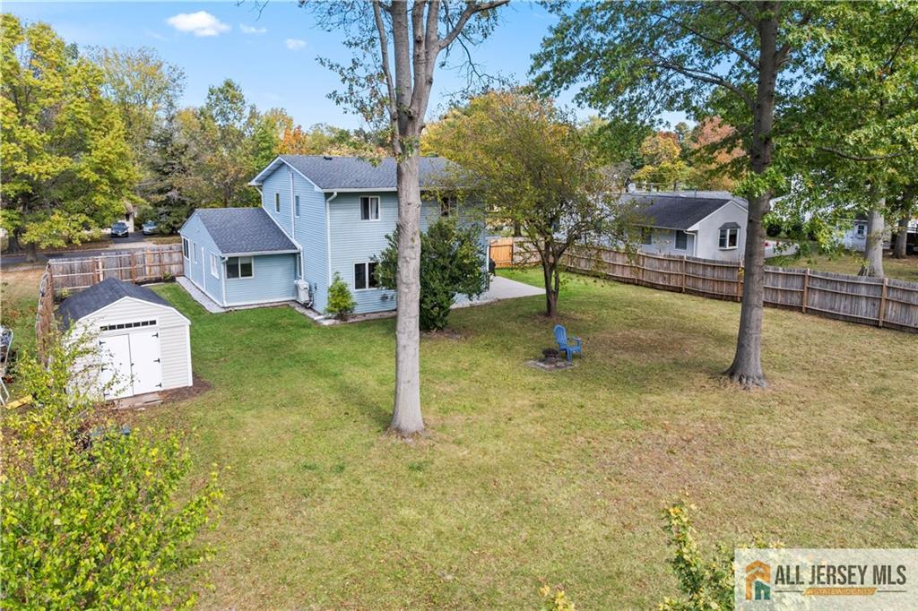 35 Emerald Road Kendall Park, NJ 08824 - Photo 29 of 37 a house view with a garden space