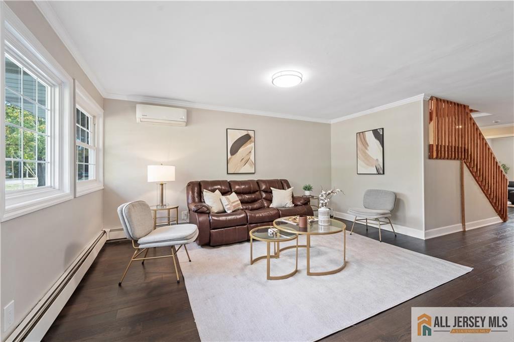 35 Emerald Road Kendall Park, NJ 08824 - Photo 7 of 37 a living room with furniture