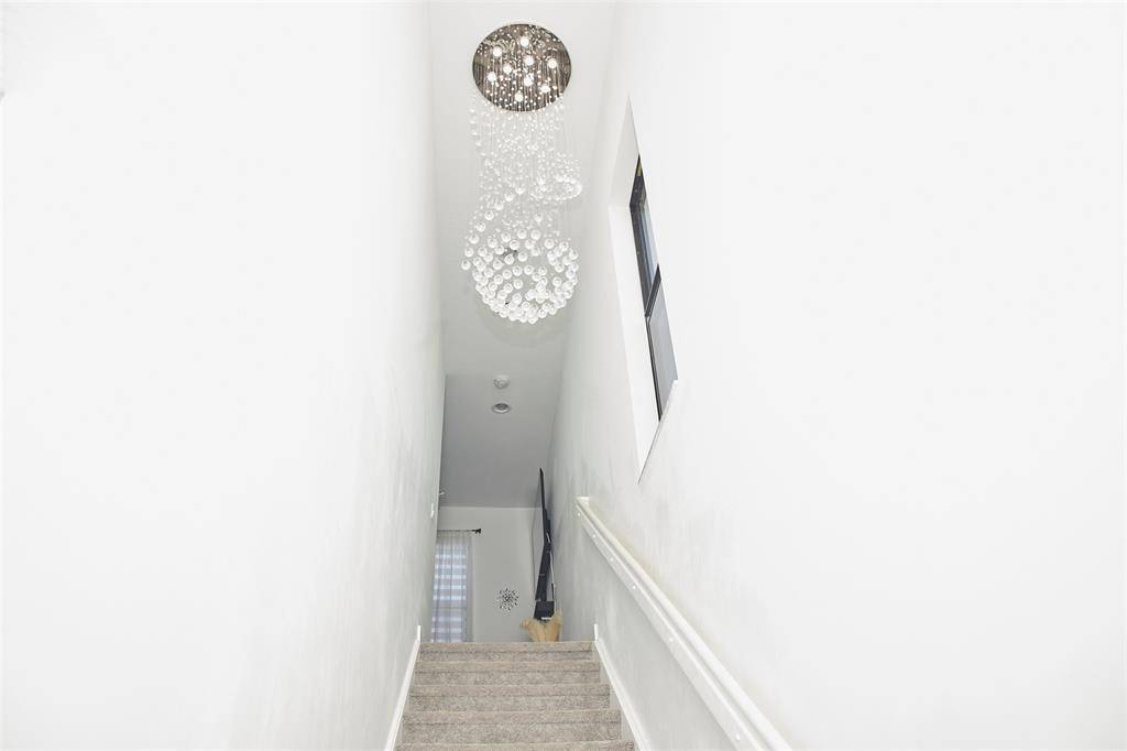 16542 Cove Road Loxahatchee, FL 33470 - Photo 9 of 33 UPSTAIR CHANDELIER