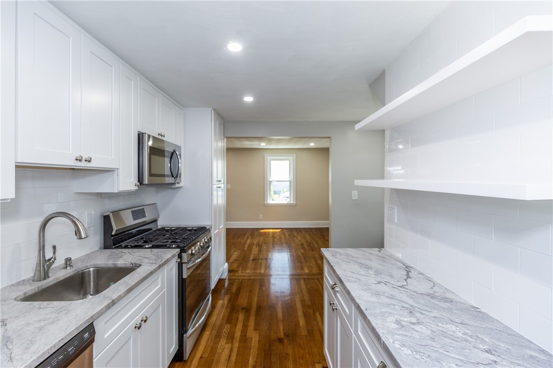 14 Archer Street Pawtucket, RI 02861 - Photo 3 of 18 Kitchen Facing Living Room