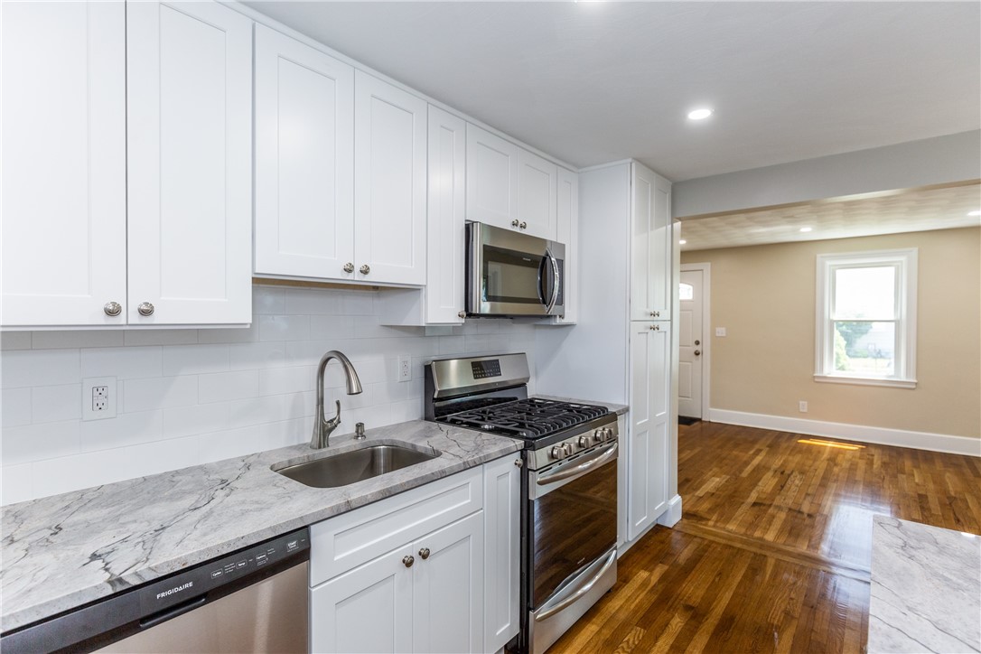 14 Archer Street Pawtucket, RI 02861 - Photo 4 of 18 Kitchen Facing Living Room