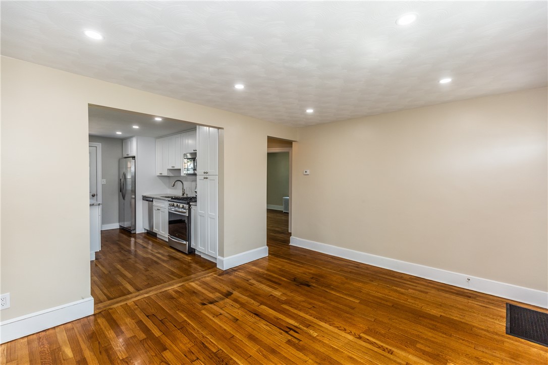 14 Archer Street Pawtucket, RI 02861 - Photo 7 of 18 Living Room Facing Kitchen