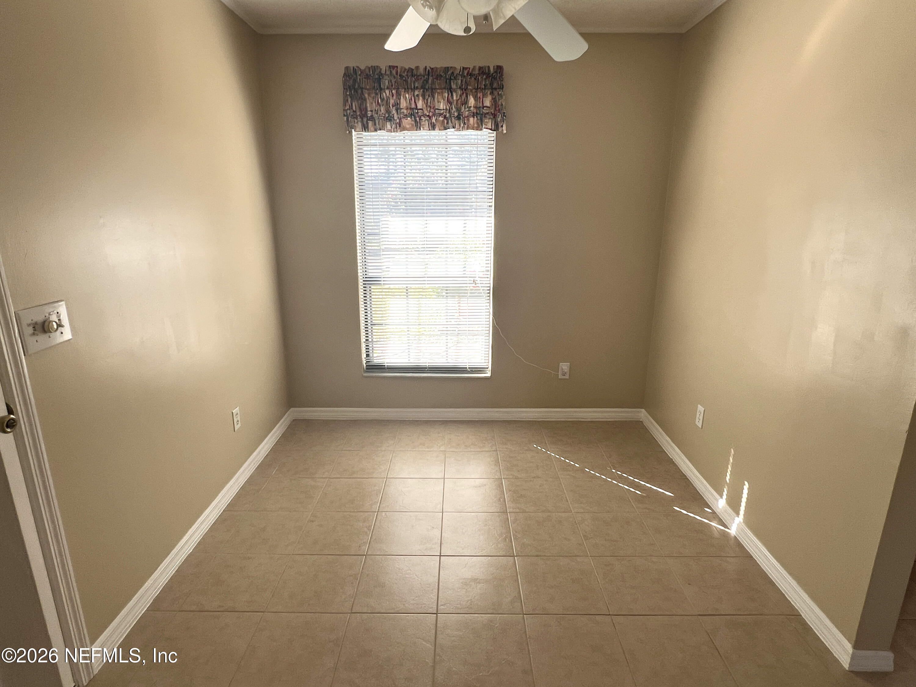 268 Wesley Road Green Cove Springs, FL 32043 - Photo 38 of 84 a view of an empty room with a window