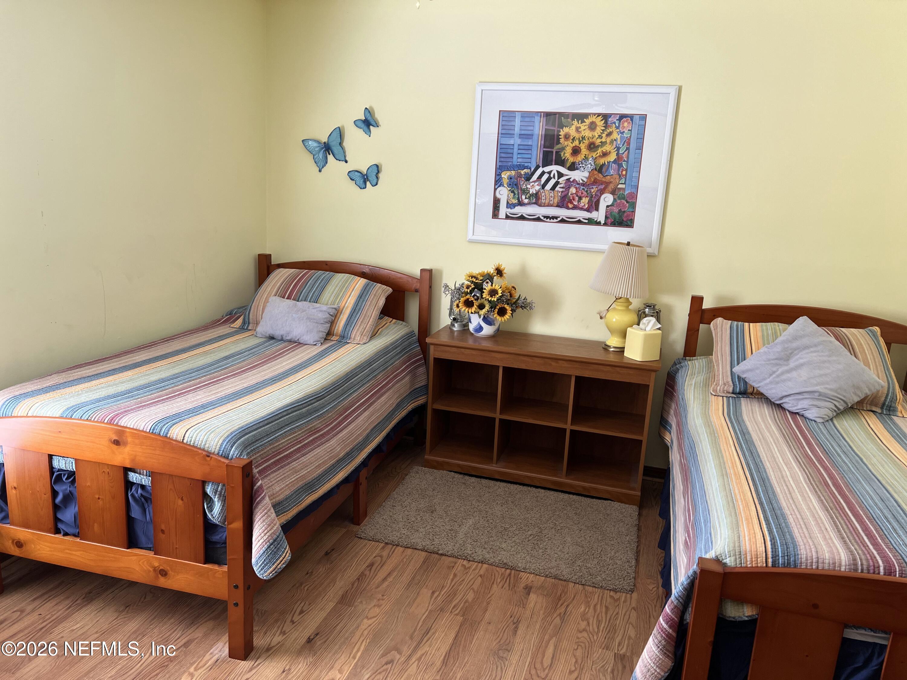 268 Wesley Road Green Cove Springs, FL 32043 - Photo 48 of 84 a bedroom with a bed and a window