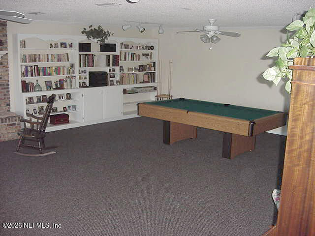 268 Wesley Road Green Cove Springs, FL 32043 - Photo 54 of 84 a reading room with furniture and book shelf