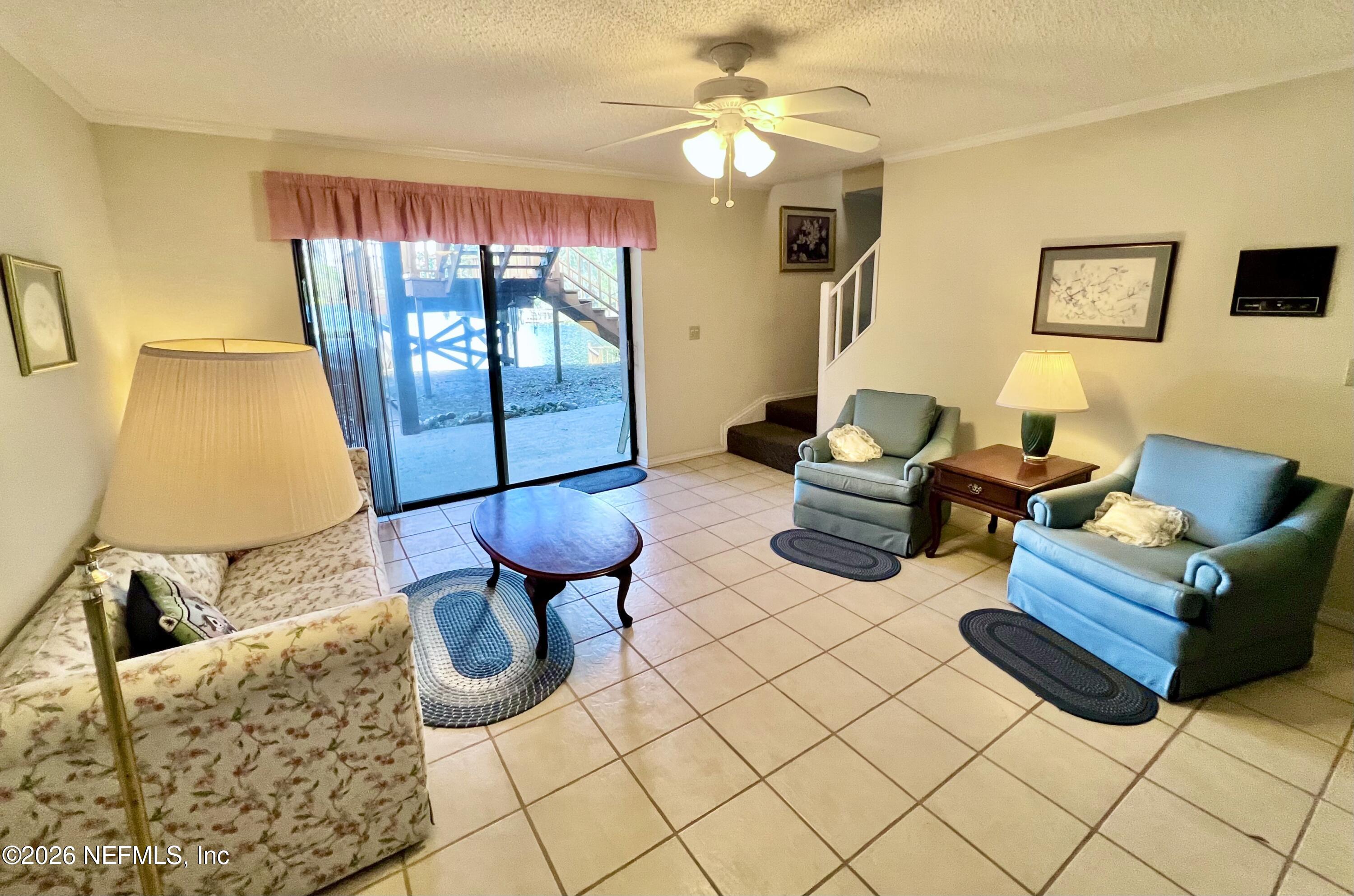268 Wesley Road Green Cove Springs, FL 32043 - Photo 60 of 84 a living room with furniture