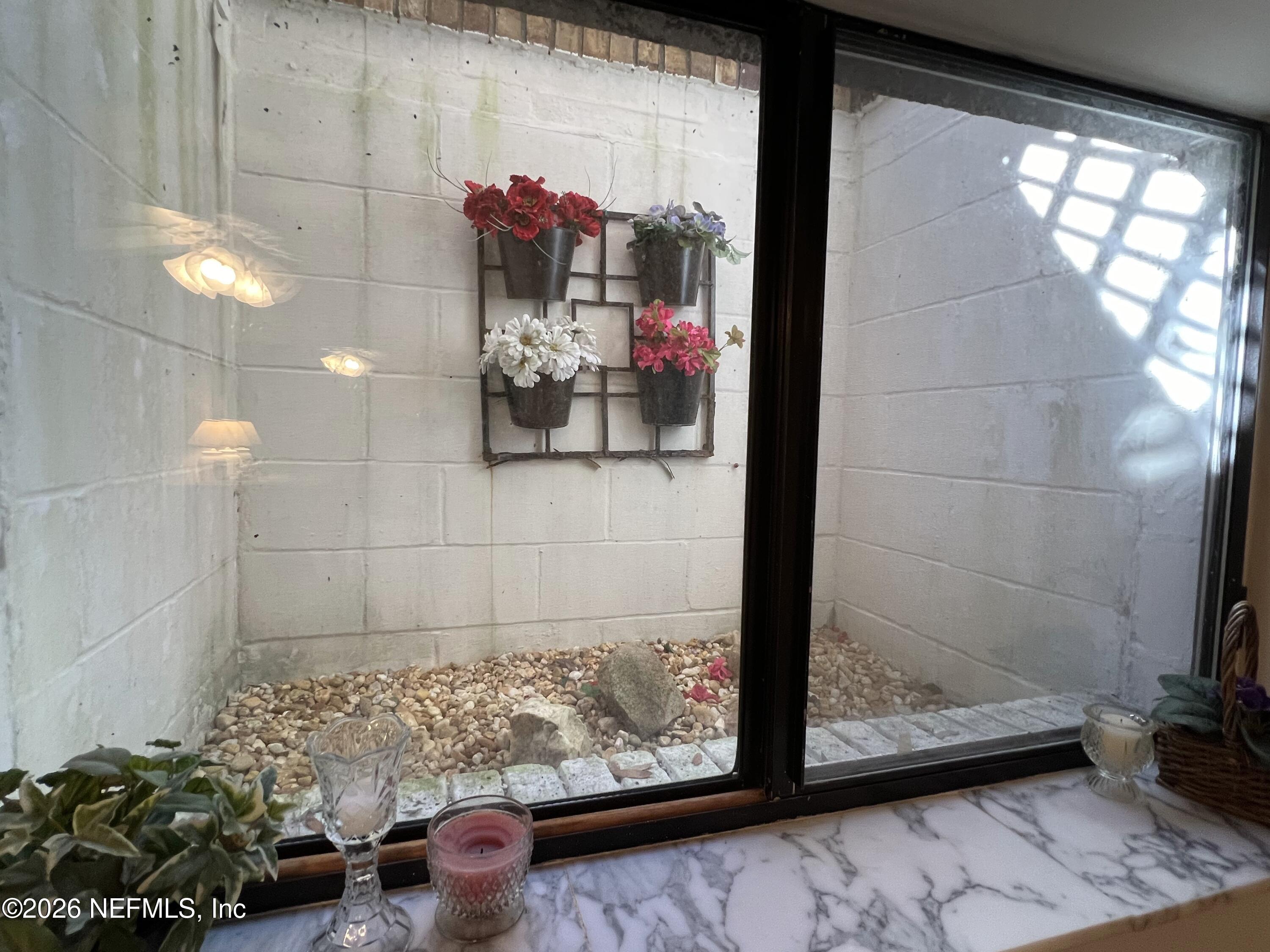 268 Wesley Road Green Cove Springs, FL 32043 - Photo 65 of 84 a view of entryway with wooden floor