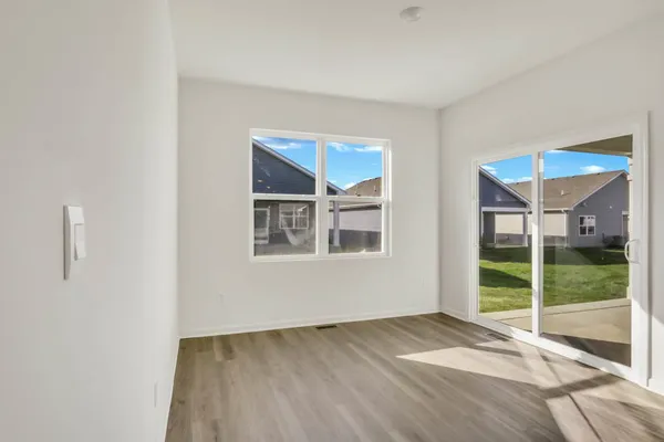 a view of an empty room and window