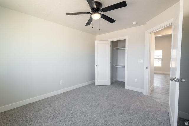 910 East Remington Road Cedar City, UT 84721 - Photo 15 of 29 Interior room featuring light grey walls, grey carpeting, and white trim