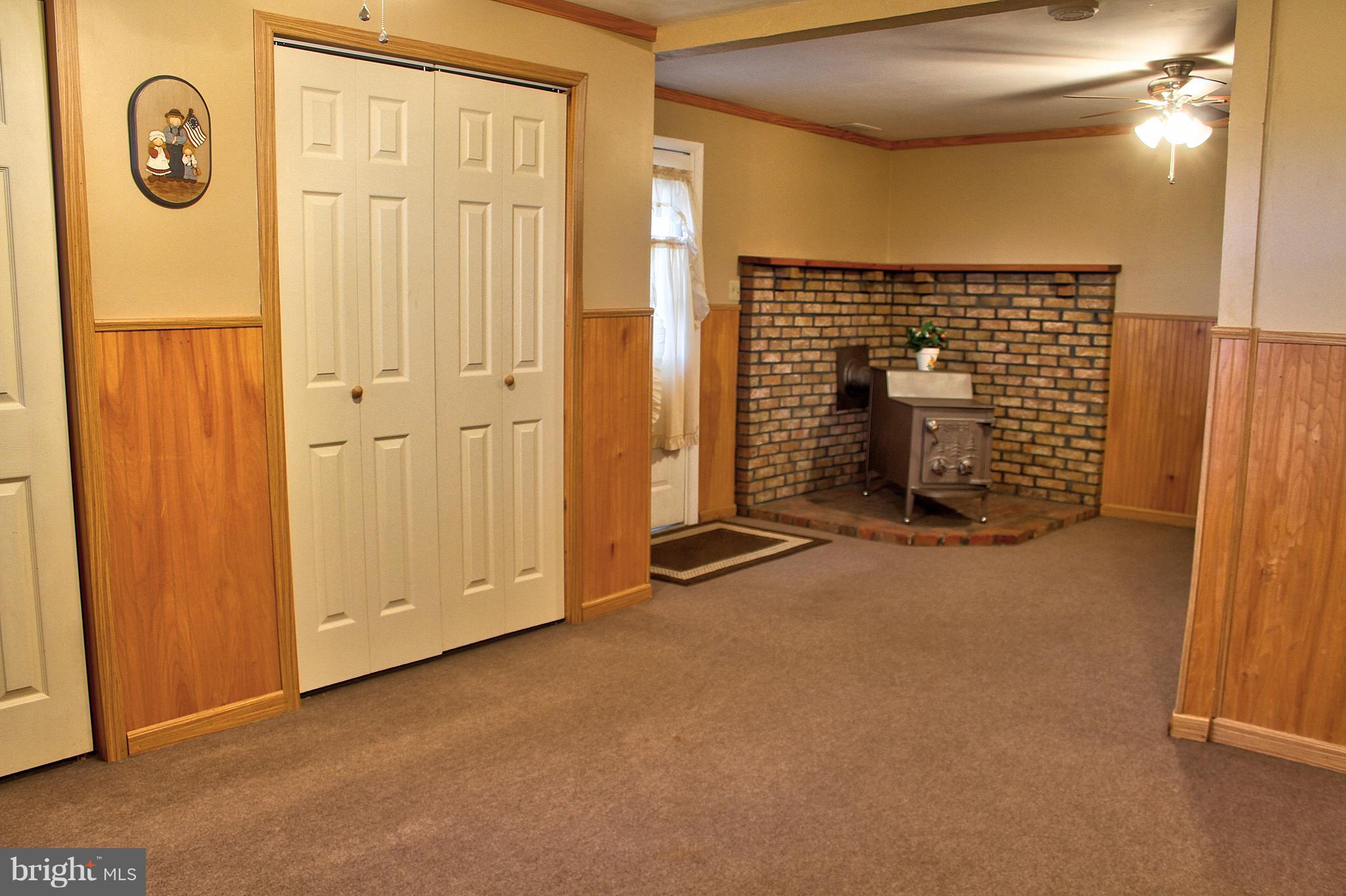 2409 Gillis Road Mount Airy, MD 21771 - Photo 2 of 27 a view of an empty room with entrance and door