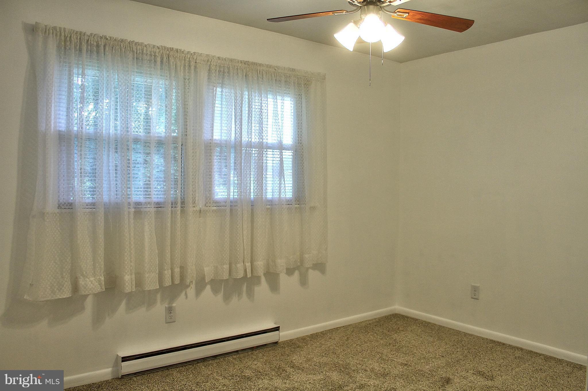 2409 Gillis Road Mount Airy, MD 21771 - Photo 13 of 27 a view of wooden floor and brick walls