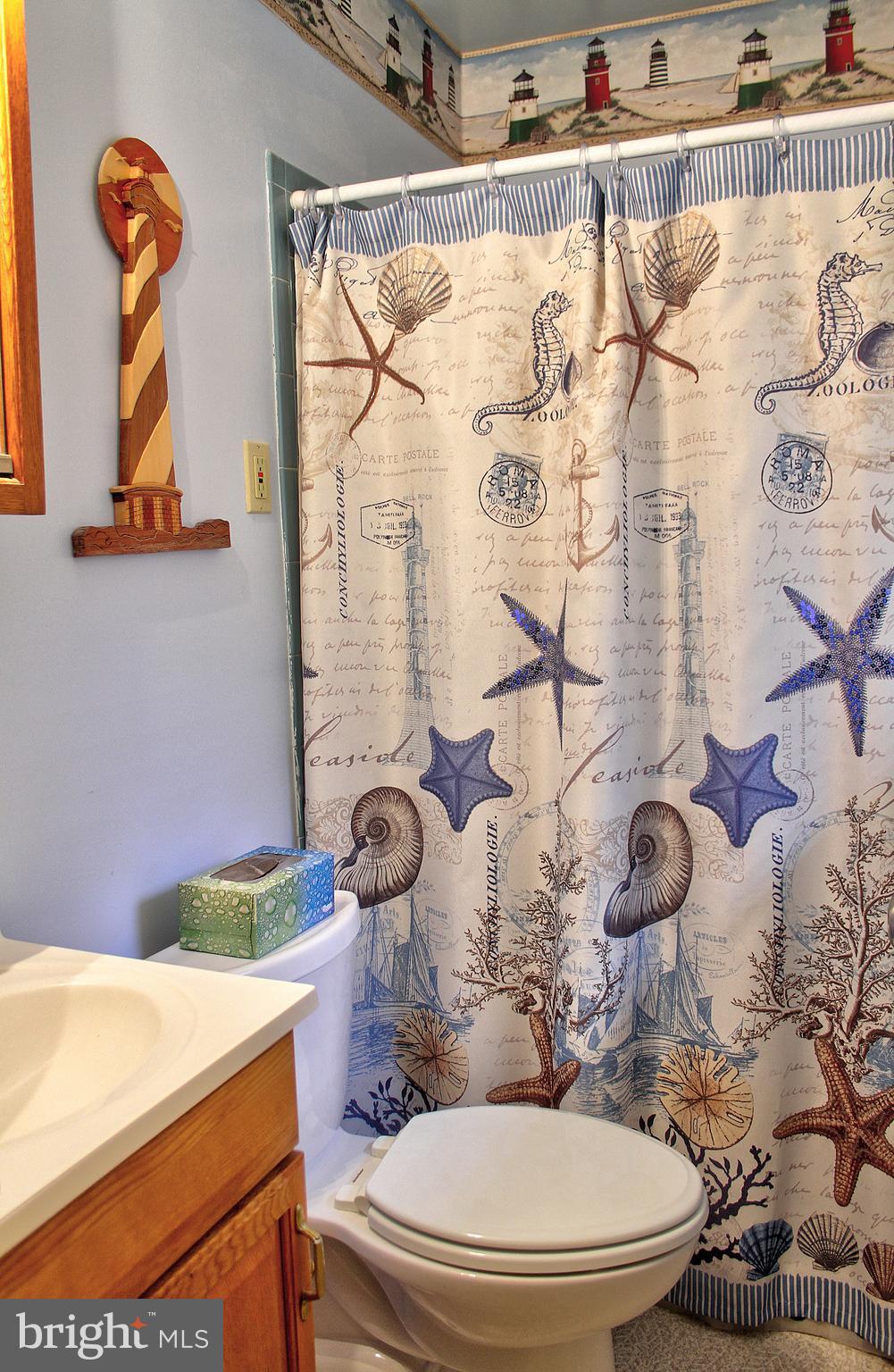 2409 Gillis Road Mount Airy, MD 21771 - Photo 16 of 27 a bathroom with a sink and a mirror