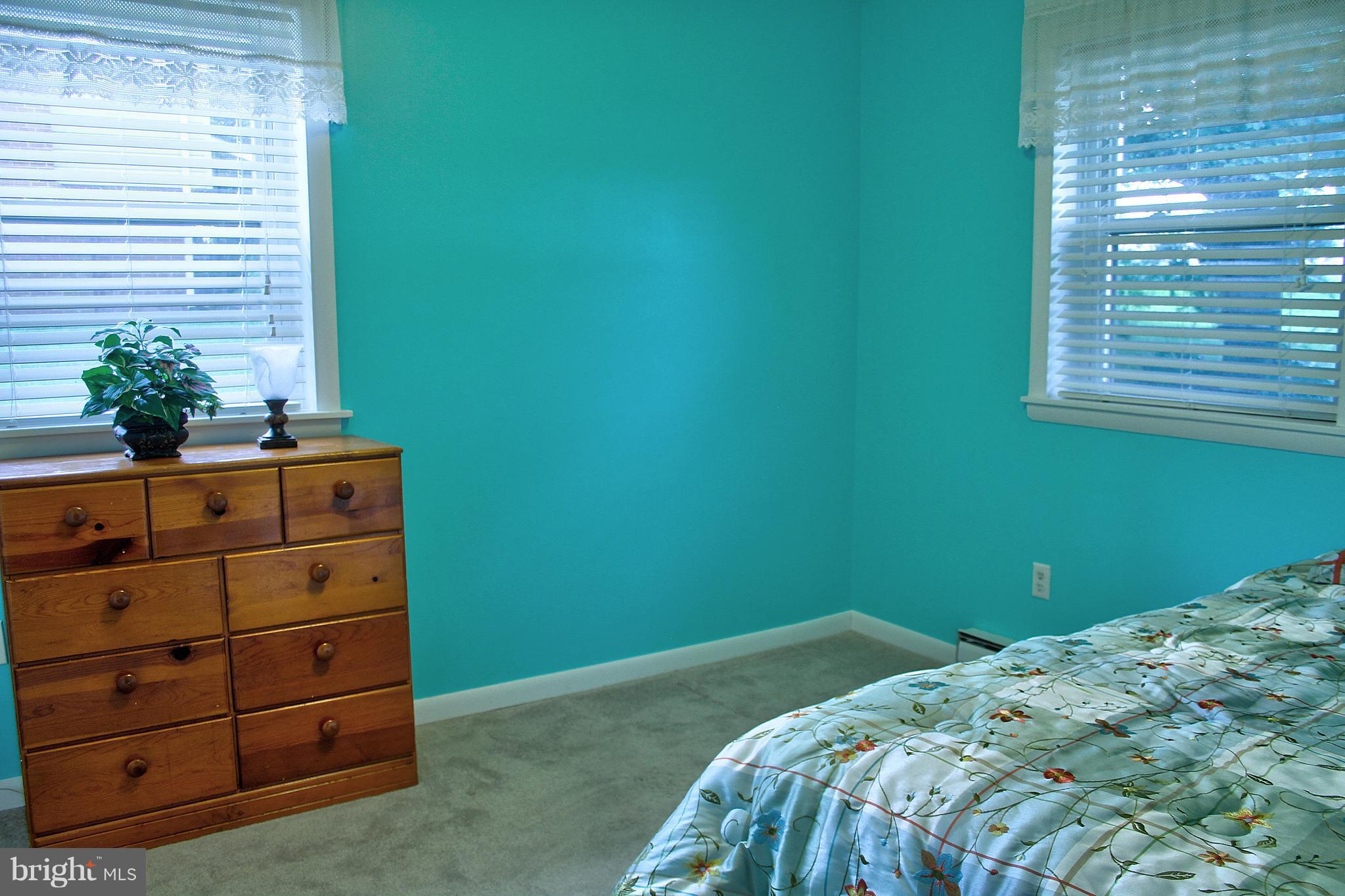 2409 Gillis Road Mount Airy, MD 21771 - Photo 3 of 27 a bedroom with a bed and a window