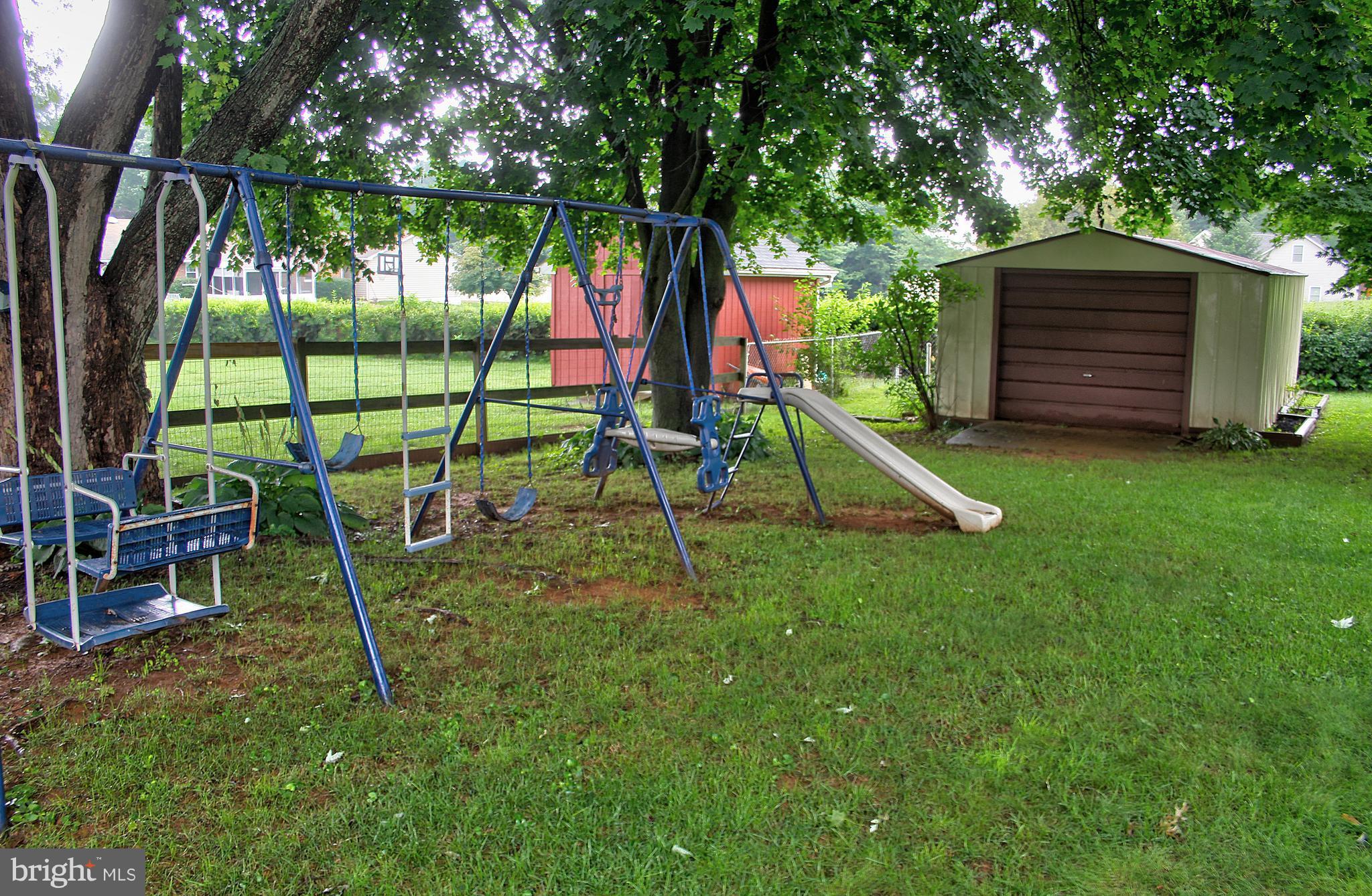 2409 Gillis Road Mount Airy, MD 21771 - Photo 21 of 27 a view of a park with swings
