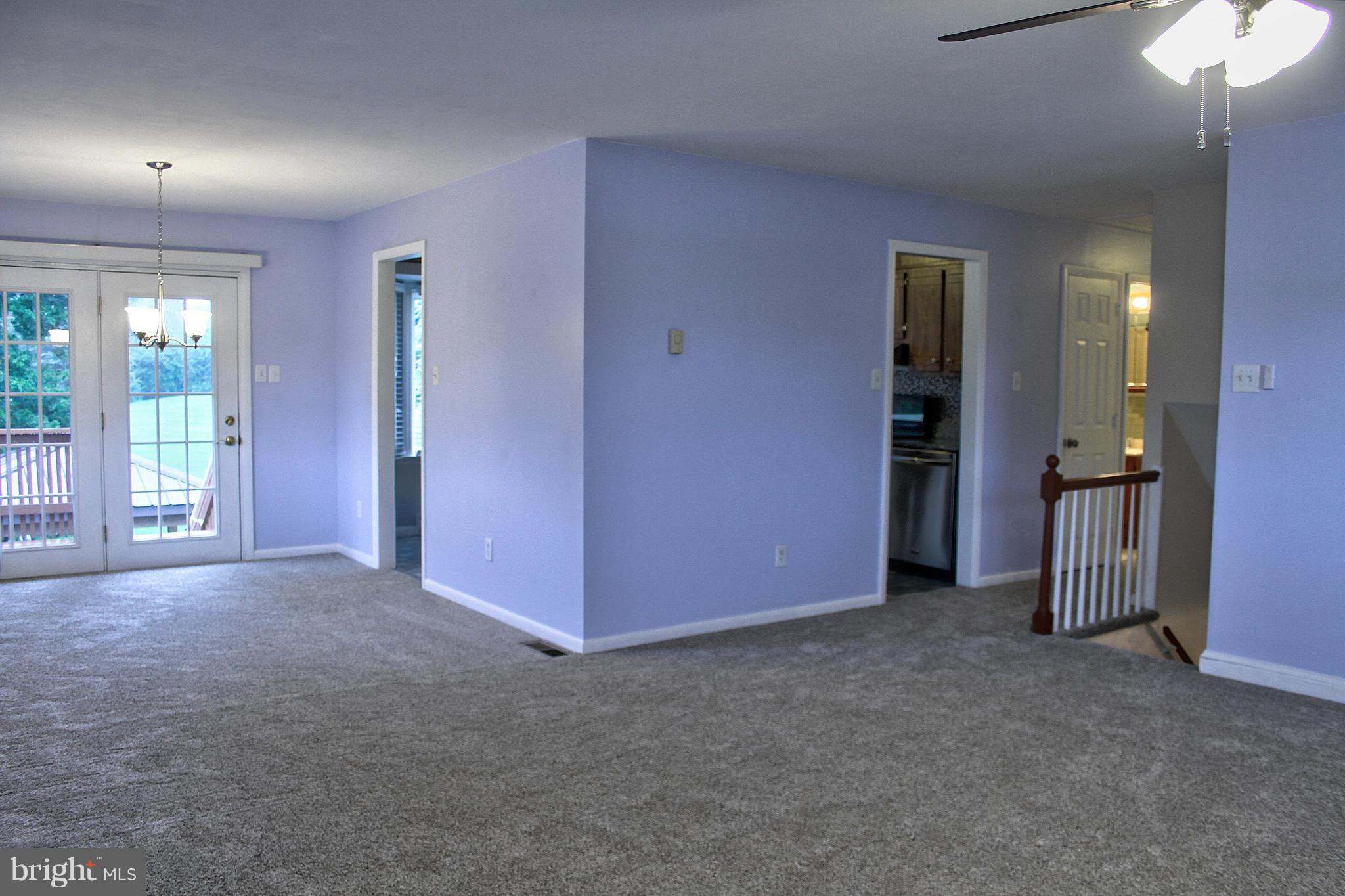 2409 Gillis Road Mount Airy, MD 21771 - Photo 8 of 27 a view of empty room with floor to ceiling window