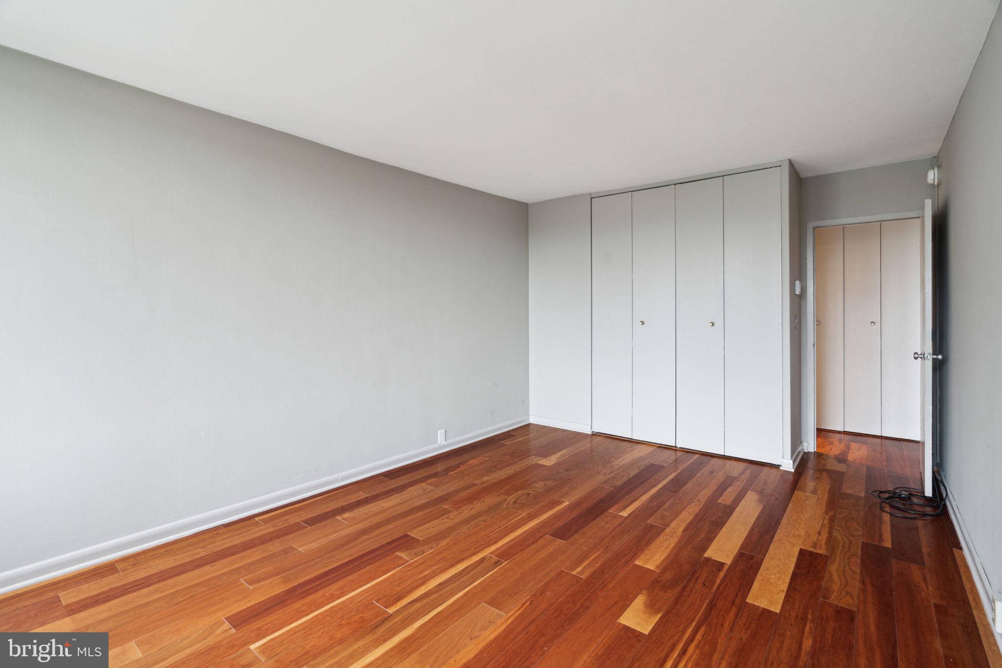 220 Locust Street, Unit 3H Philadelphia, PA 19106 - Photo 18 of 29 a view of a room with wooden floor