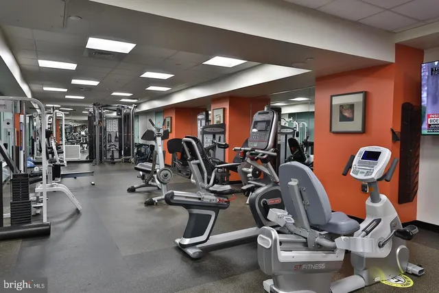 a view of parking garage with cars