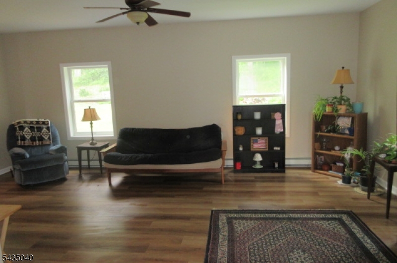 28 Beaver Run Road Lafayette, NJ 07848 - Photo 36 of 36 a living room with furniture and a fireplace
