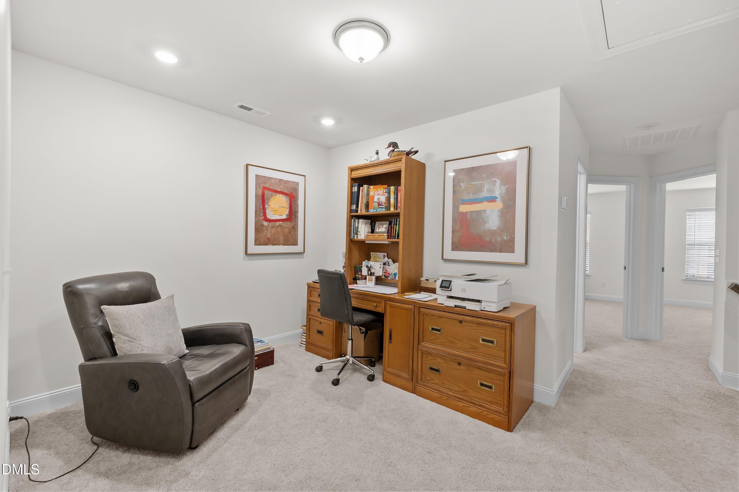 1014 Culloden Circle Durham, NC 27713 - Photo 17 of 32 a livingroom with workspace and a couch