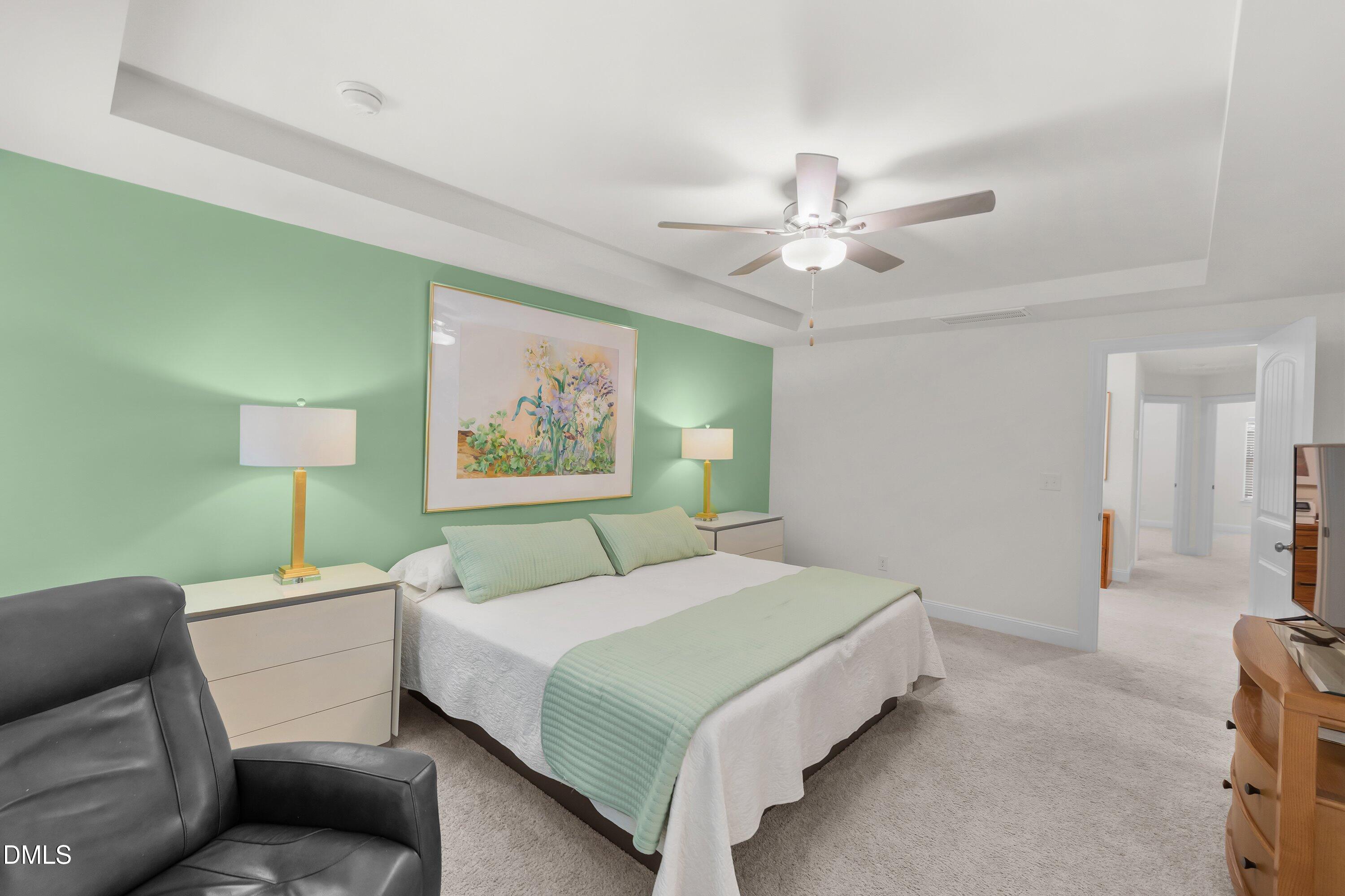 1014 Culloden Circle Durham, NC 27713 - Photo 19 of 32 a bedroom with a bed couch and a window