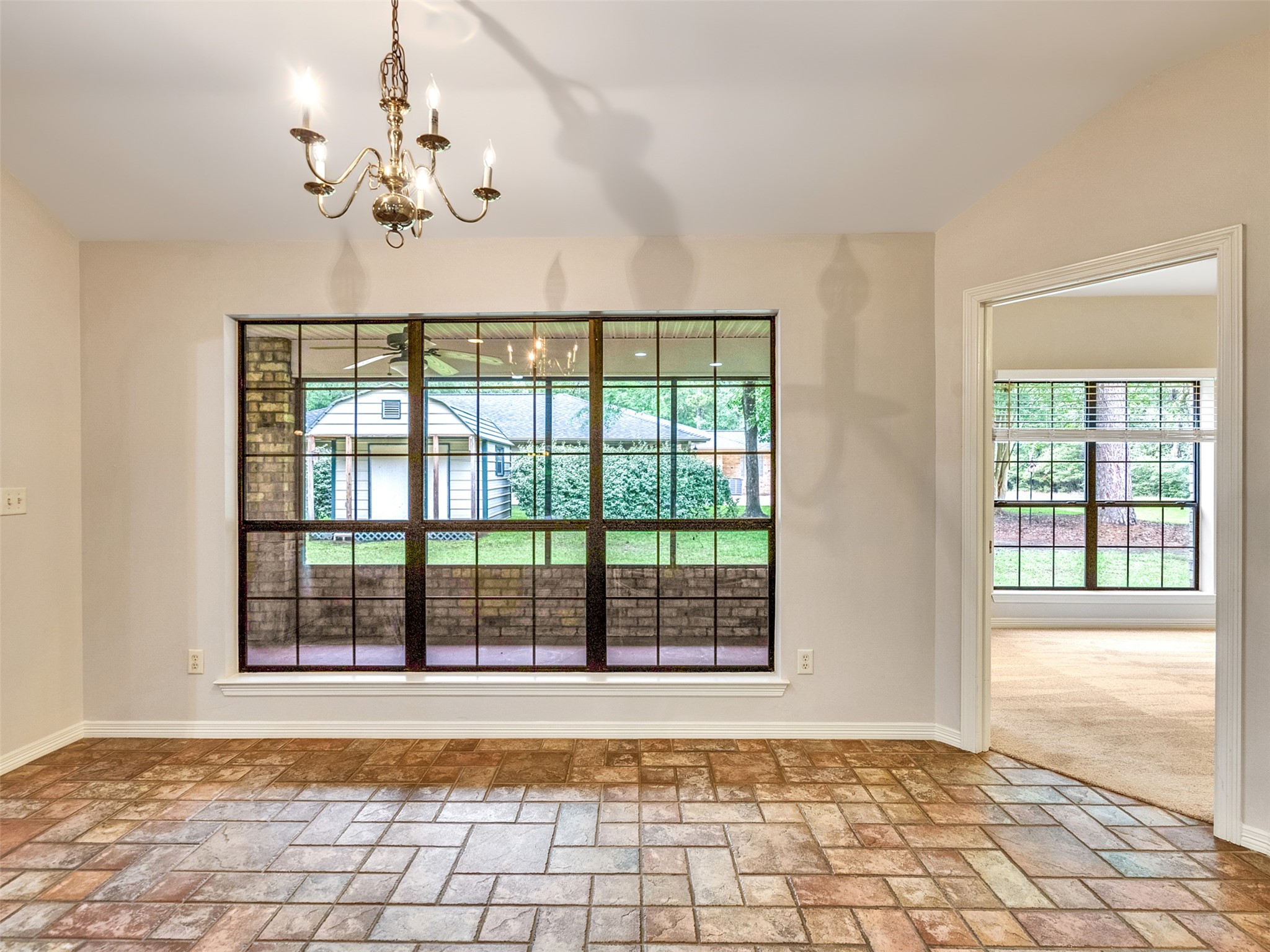 195 Coral Gables Trinity, TX 75862 - Photo 17 of 50 a view of an empty room with a window