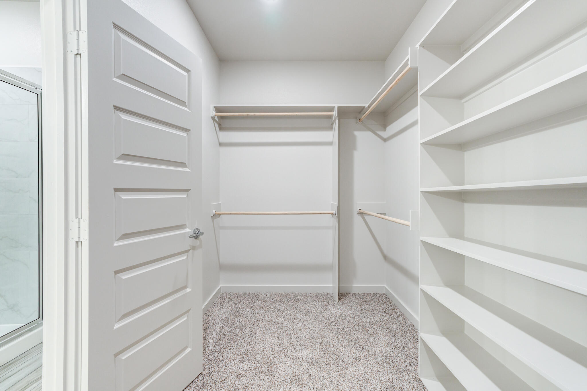 7046 41st Street Lubbock, TX 79407 - Photo 25 of 28 a view of an empty walk in closet