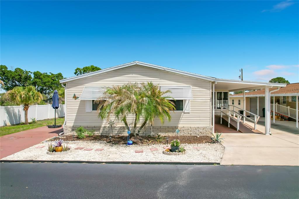 452 Par Drive Frostproof, FL 33843 - Photo 1 of 41 a front view of a house with a yard