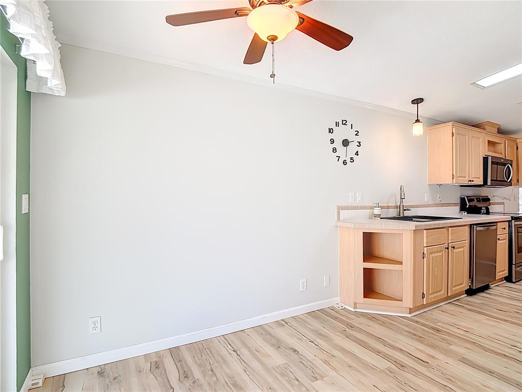 452 Par Drive Frostproof, FL 33843 - Photo 18 of 41 a room with a white cabinets and white appliances