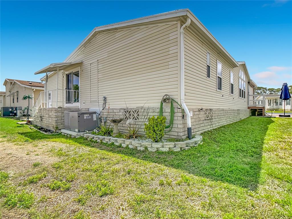 452 Par Drive Frostproof, FL 33843 - Photo 2 of 41 a view of backyard of house