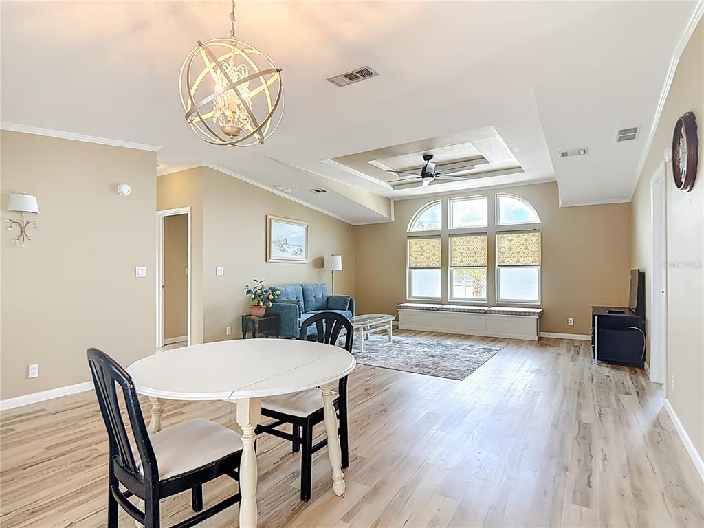 452 Par Drive Frostproof, FL 33843 - Photo 9 of 41 a view of a dining room with furniture window and wooden floor