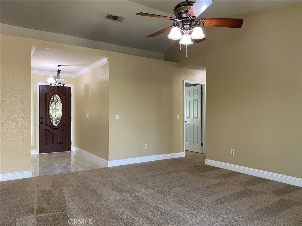 5409 Covert Road Salida, CA 95368 - Photo 4 of 23 a view of a livingroom with a chandelier fan