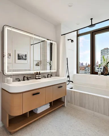 a bathroom with a bathtub and a sink