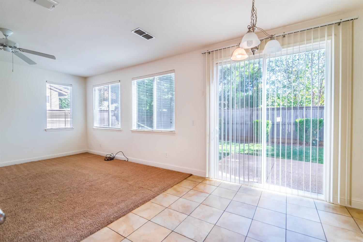 11737 Brook Valley Way Rancho Cordova, CA 95742 - Photo 11 of 25 a view of an empty room with a window