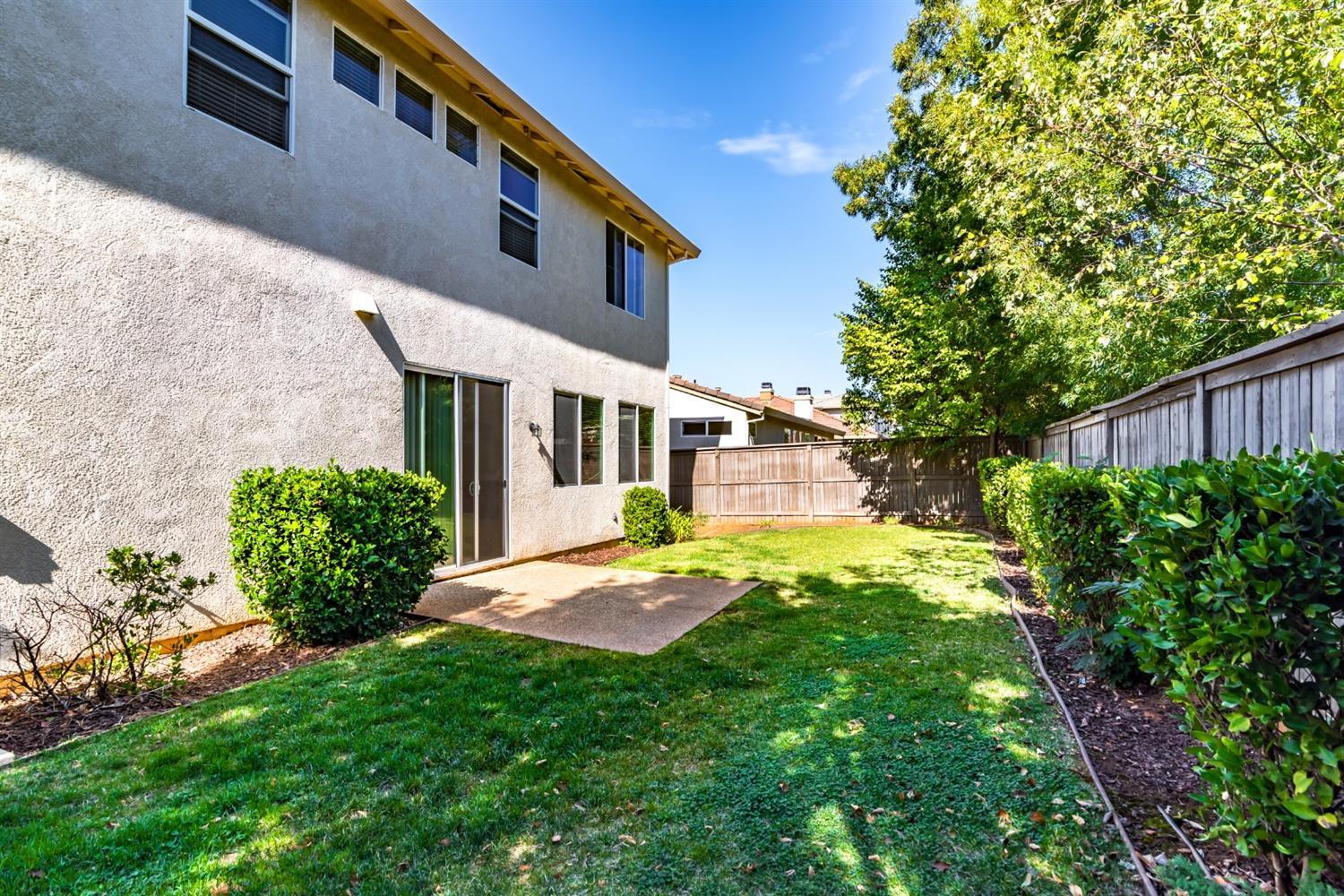11737 Brook Valley Way Rancho Cordova, CA 95742 - Photo 25 of 25 a view of a house with a backyard