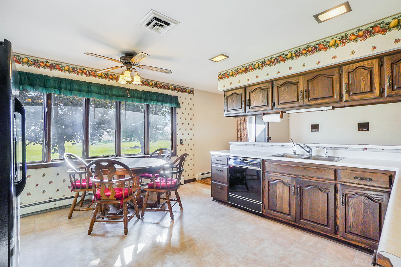 1850 Little Rock Road Plano, IL 60545 - Photo 8 of 30 a kitchen with stainless steel appliances granite countertop a stove and cabinets