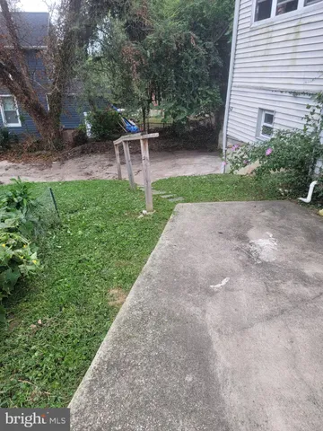 a view of a backyard with a garden