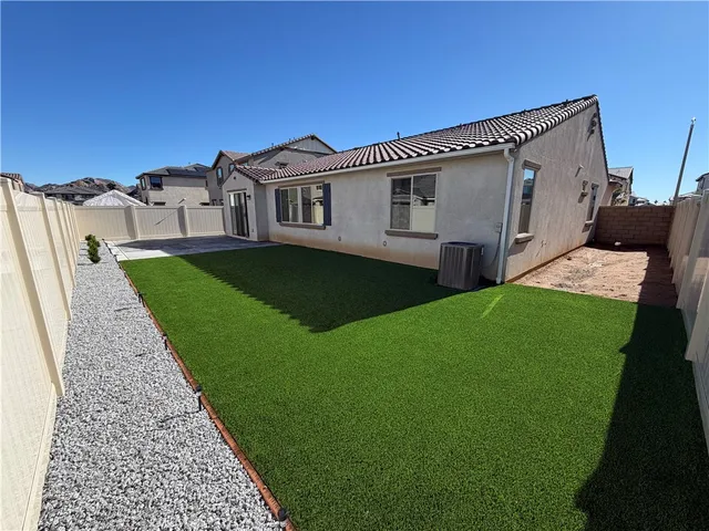 a aerial view of a house with garden
