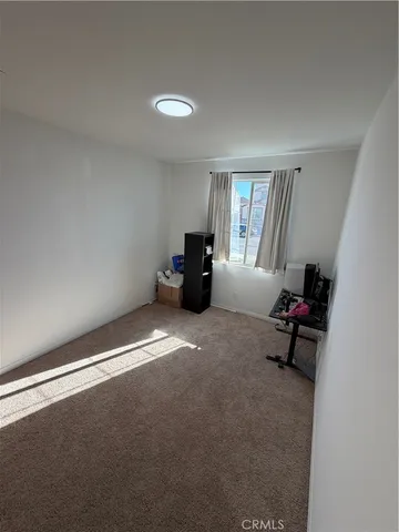 a room with furniture and a window