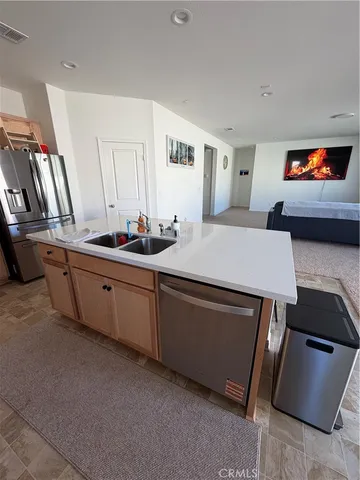 a room with furniture and a flat screen tv