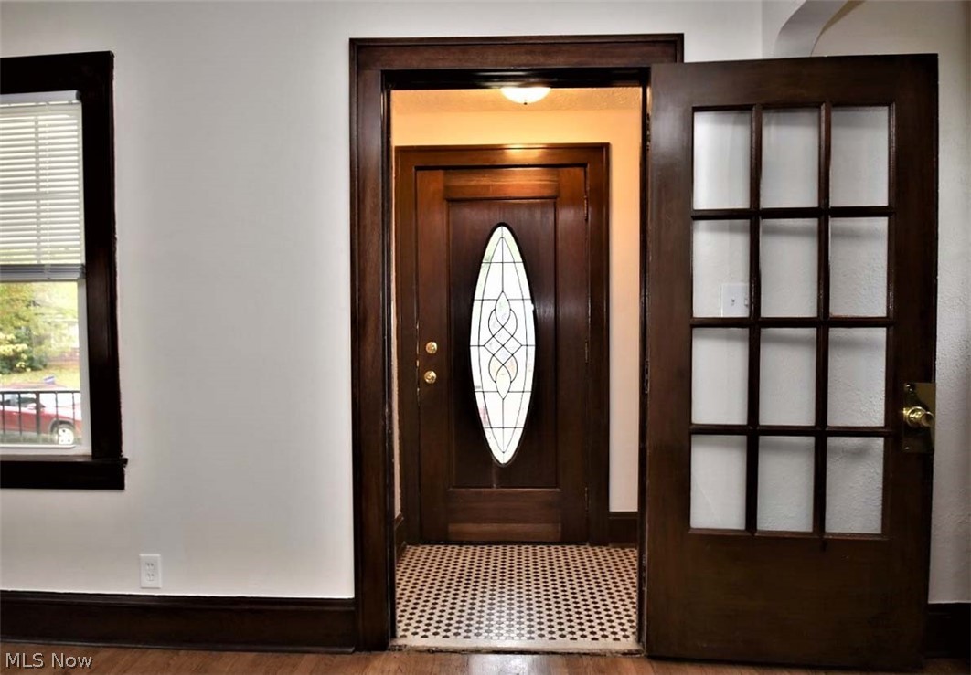 3964 Ardmore Road Cleveland Heights, OH 44121 - Photo 4 of 33 The foyer has a vintage tiled floor and a coat closet.